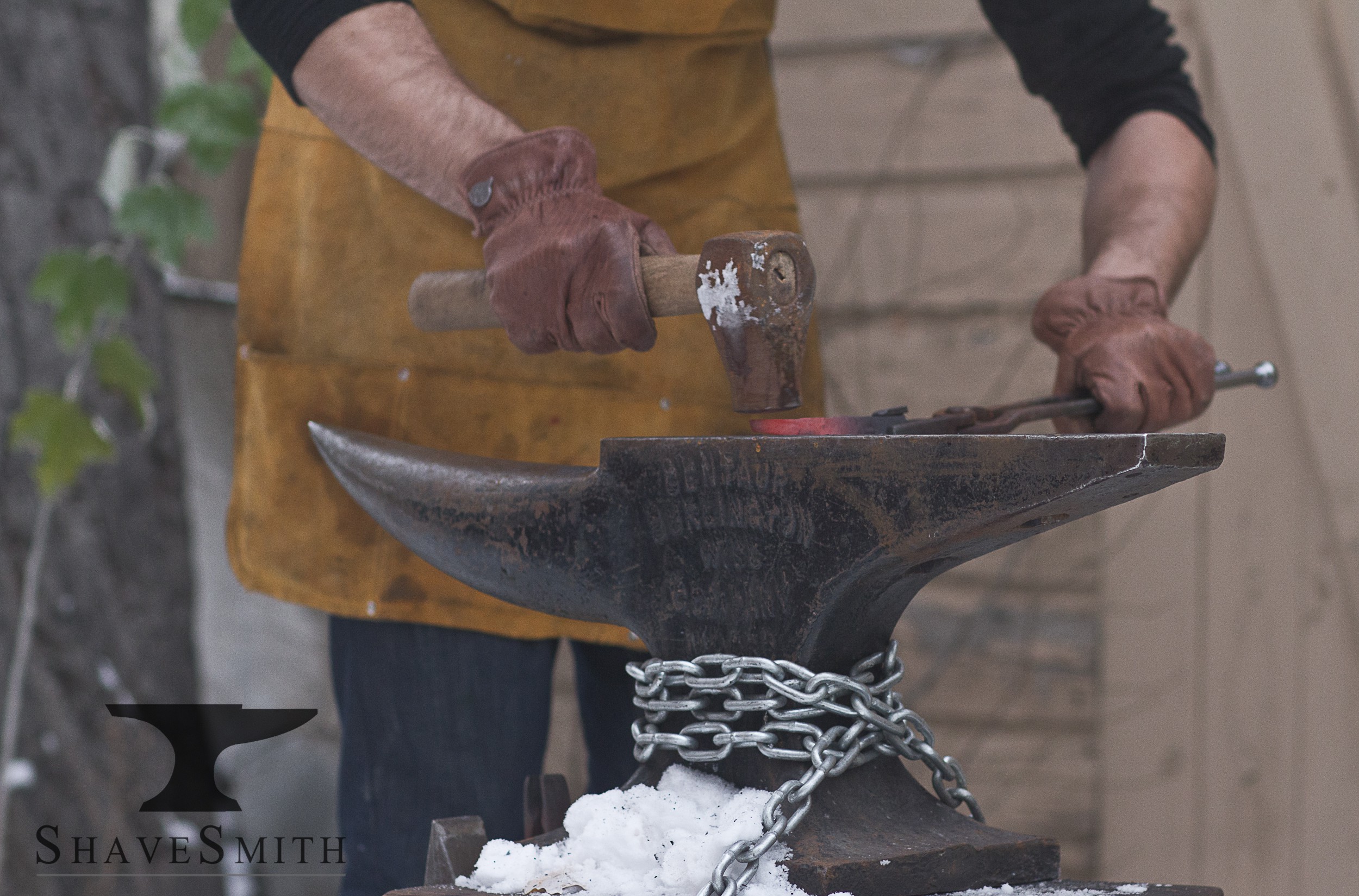 Hammering & drawing out the handle.