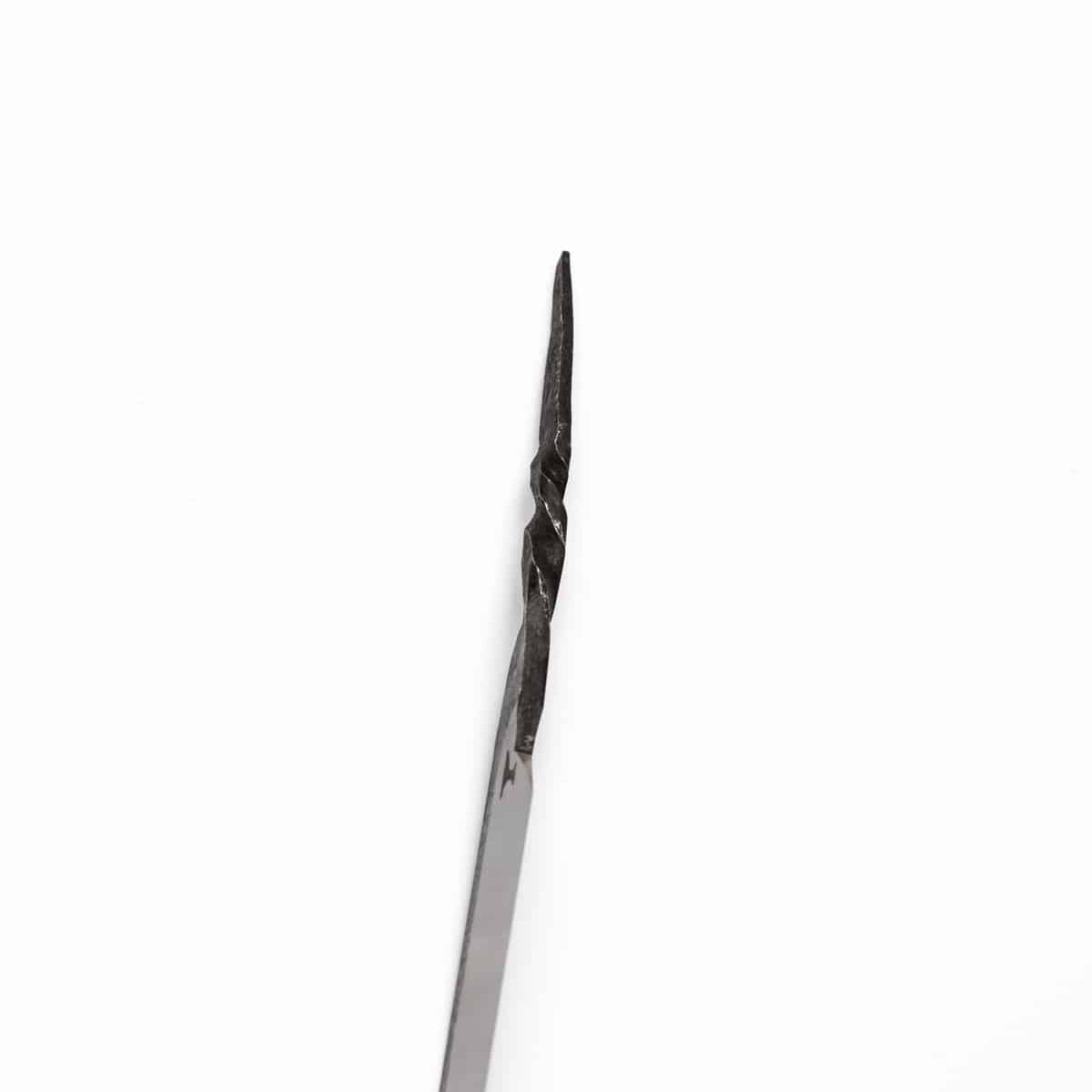 A hand forged custom kamisori razor with twisted handle.