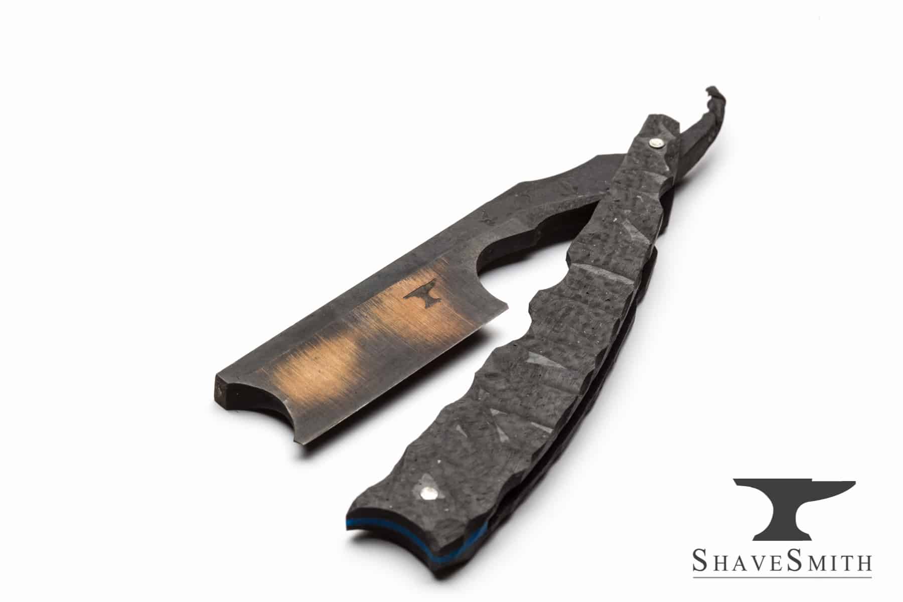 I made this custom western razor with craggy and hewn textures and colors. By the end of the craft, the razor turned into one of the most unique examples of forged straight razors with one of a kind personality and a smooth shave that's unforgetable.
