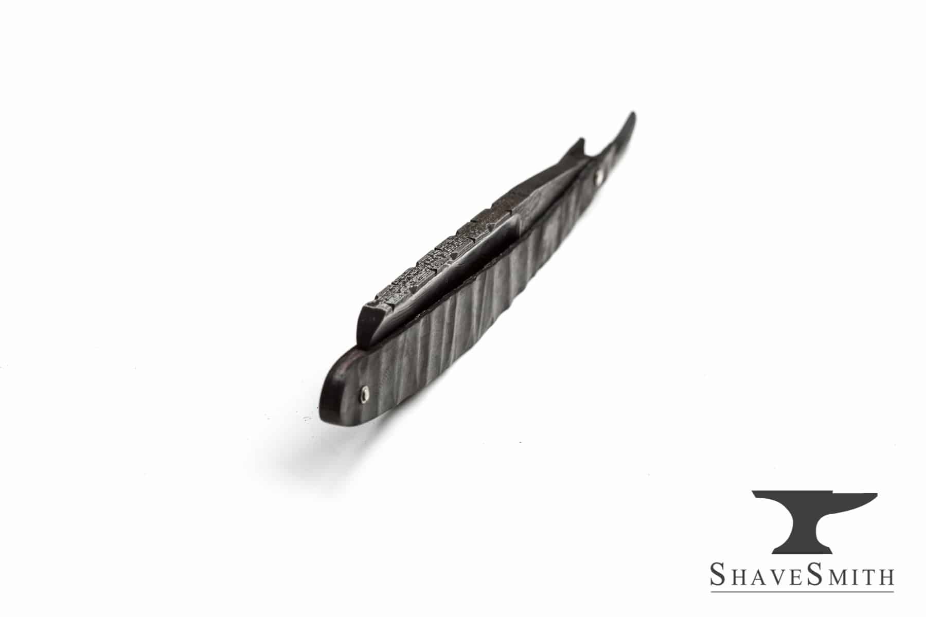 A hollow ground custom straight razor made by ShaveSmith