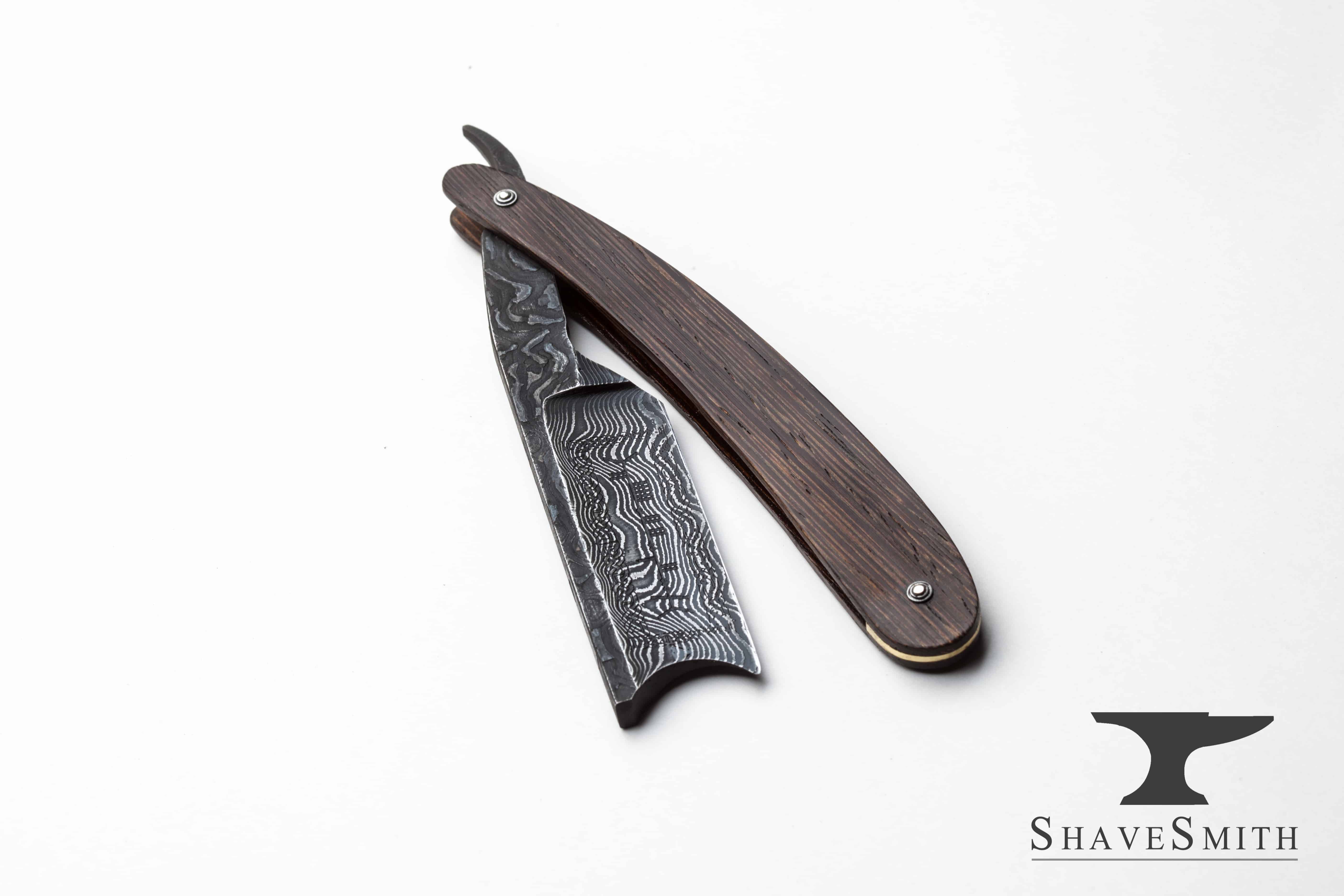 A shop update with recent work - a damascus blade with ancient Runes.